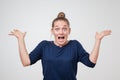 Human face expressions and emotions. Portrait of young desperate european woman with mouth wide open. Royalty Free Stock Photo