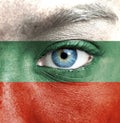 Human face painted with flag of Bulgaria Royalty Free Stock Photo