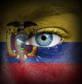 Human face painted with flag of Ecuador