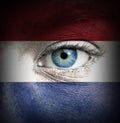 Human face painted with flag of Netherlands Royalty Free Stock Photo