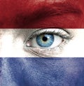 Human face painted with flag of Netherlands Royalty Free Stock Photo