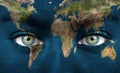 Human face painted with planet earth Royalty Free Stock Photo