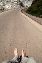 Human feet above the road, Hormuz Island, Hormozgan Province, Ir