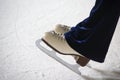 Human feet in fads standing on ice Royalty Free Stock Photo