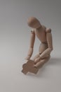 human figurine depicting a lonely bored person, the concept of abandonment and uselessness