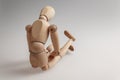 human figurine depicting a lonely bored person, the concept of abandonment and uselessness