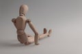 Human figurine depicting a lonely bored person, the concept of abandonment and uselessness, despair and depression, autism, mental