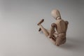 Human figurine depicting a lonely bored person, the concept of abandonment and uselessness, despair and depression, autism, mental