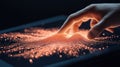 Human finger interacting with glowing orange data points on a dark virtual interface. Dynamic light waves respond, shaping a Royalty Free Stock Photo