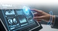 Human finger interacts with futuristic digital touchscreen display technology data interface Royalty Free Stock Photo