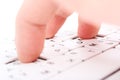 Human finger on a laptop keyboard. Press a key Royalty Free Stock Photo