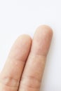 Human fingers on white background