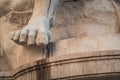 Human foot - architectural detail from sculpture on the facade of Hofburg imperial palace in Vienna, Austria Royalty Free Stock Photo