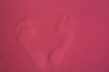 human foot prints top view  pink background Royalty Free Stock Photo