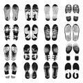 Human foot steps barefoot and in shoes. Black dirty footprints silhouettes, boot and sneakers print. Isolated footstep Royalty Free Stock Photo