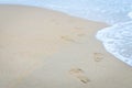 Human footprint on the sea beach. Royalty Free Stock Photo