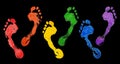 Human footprints LGBTQ community rainbow flag colors black background isolated, foot print diversity, LGBT people pride symbol