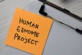 Human Genome Project text write on sticky notes with office desk Royalty Free Stock Photo