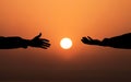 Human hand Asking help Concept. hands helping each other Against Sunset background. People helping, God salvation and Get Hired