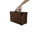 Human hand carrying briefcase