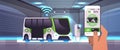 human hand charging electric bus in mobile app battery vehicle at recharging power station charger EV management