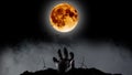 Human hand climbs into the cemetery from behind a bright yellow moon and a blue twinkles. Black smoky background