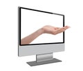 Human hand coming out from computer screen