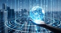 Digital globe floats above a person\'s hand with binary code cascading in background Royalty Free Stock Photo