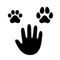 Human hand with dog and cat paw Royalty Free Stock Photo