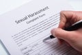 Human Hand Filling Sexual Harassment Complaint Form Royalty Free Stock Photo