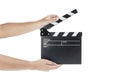 Human hand holding black clapper board Royalty Free Stock Photo