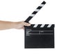 Human hand holding black clapper board Royalty Free Stock Photo