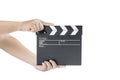 Human hand holding black clapper board Royalty Free Stock Photo