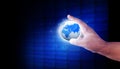Human hand holding the digital world Royalty Free Stock Photo