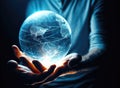 Human hand holding glass ball globe of the Earth with blue light inside, World environment and earth day concept Royalty Free Stock Photo