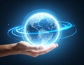 Human hand holding glowing digital Earth globe with network connection lines on a dark background Royalty Free Stock Photo