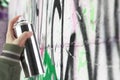 Human hand holding a graffiti Spray can Royalty Free Stock Photo