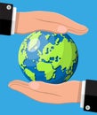 Human hand holding green earth. Save earth day.