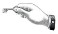 Human hand holding key drawing vintage style black and white clip art isolated on white background Royalty Free Stock Photo