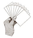 Human hand holding a number of blank cards or slips of paper