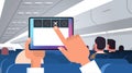 Human hand holding tablet pc with flight mode rules of airplane safety concept modern plane board with passengers