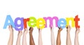 Human Hand Holding the Word Agreement Royalty Free Stock Photo