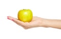 Human hand holding yellow apple Royalty Free Stock Photo