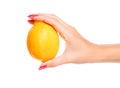 Human hand holding yellow lemon Royalty Free Stock Photo