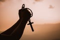 The human hand holds cross a christian religion Royalty Free Stock Photo