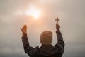 Human hand holds cross and open palm up worship. Eucharist Therapy Bless God Helping Repent Catholic Easter Lent Mind Pray. Chris Royalty Free Stock Photo