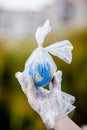 The human hand holds the planet earth in a plastic bag. The concept of pollution by plastic debris. Global warming due to Royalty Free Stock Photo