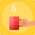 Human hand holds red ceramic cup with coffe or tea. Royalty Free Stock Photo