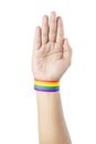 Human hand with LGBT rainbow flag wristband