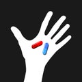 Human hand and palm is holding red and blue pill. Royalty Free Stock Photo